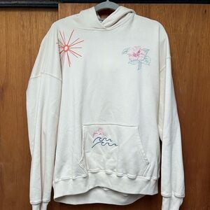 Hollister Cream Hoodie with Floral and Wave Design
